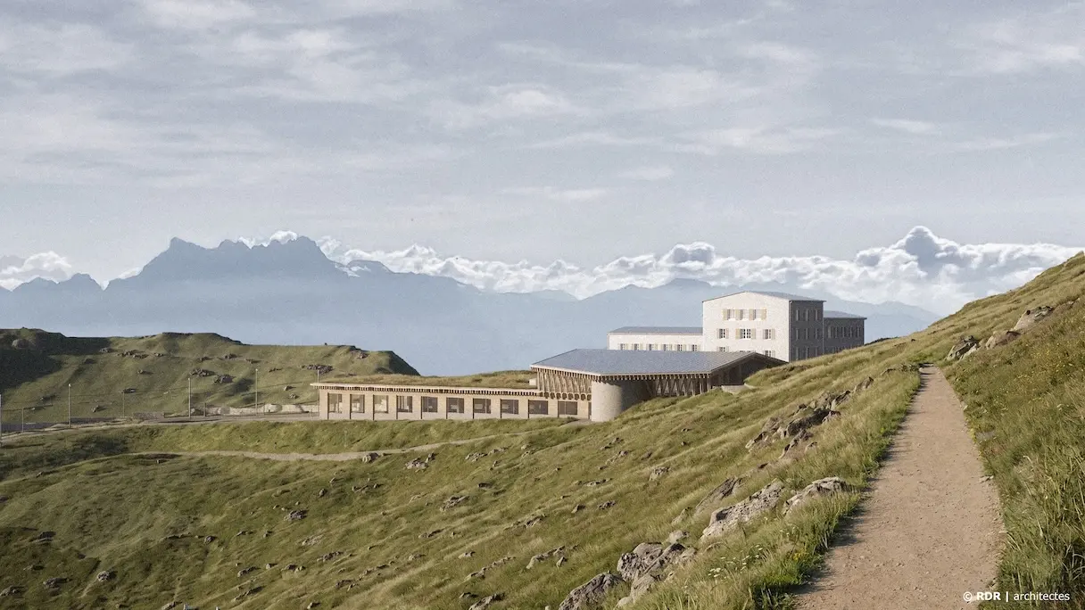 Der neue Bahnhof, halb versenkt, vollständig in die Landschaft integriert